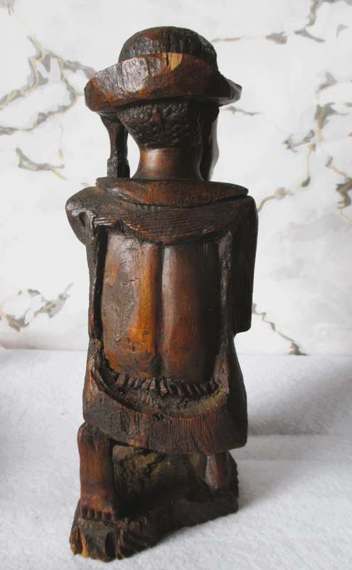 Very nice Dark wood carved old  African man smoking his pipe. 28cm high. Marked Harold.