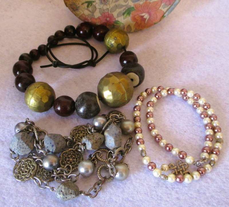 Vintage Valeur round Powder container, covered with material, contains some vintage jewelry.