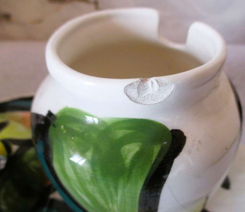 Hand made and painted honey pot with plate. Marked Glaudine. Please note chip and repaired crack.