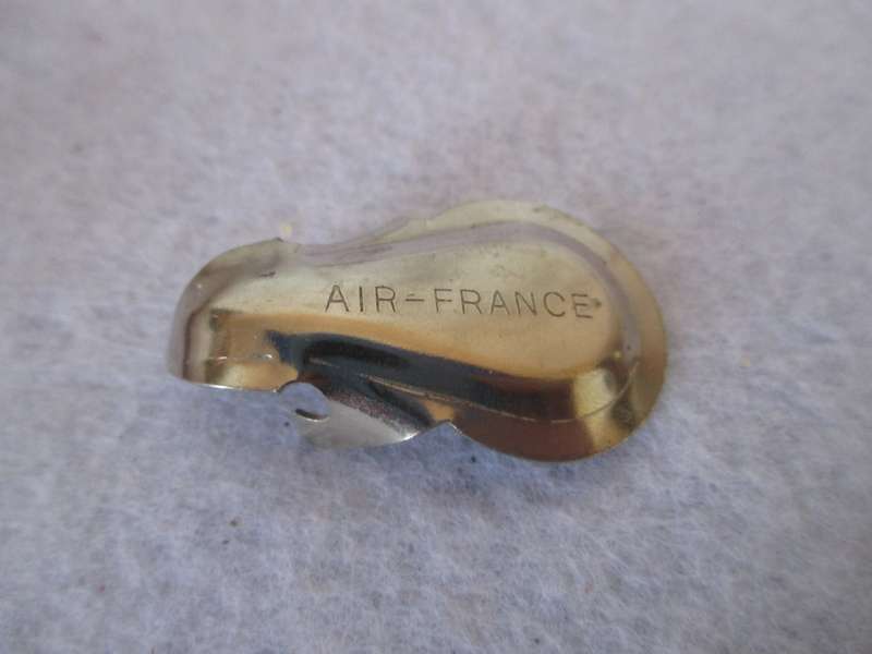 Vintage Travel Sewing Kit from SAA and Air France bottle opener.