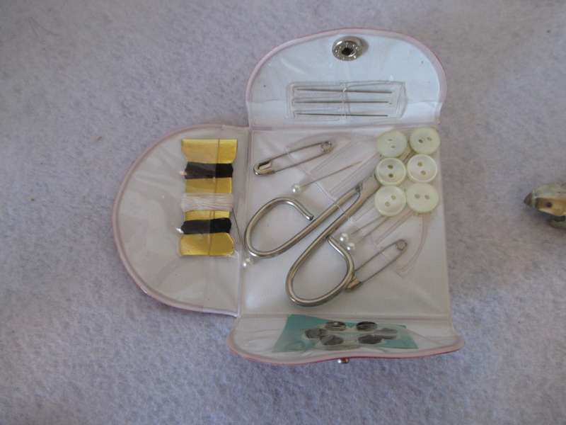 Vintage Travel Sewing Kit from SAA and Air France bottle opener.