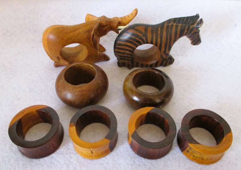 Lot of 8 handcarved wooden napkin holders.