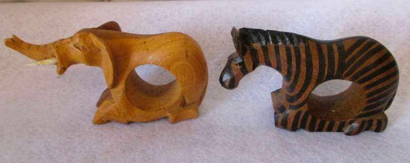 Lot of 8 handcarved wooden napkin holders.