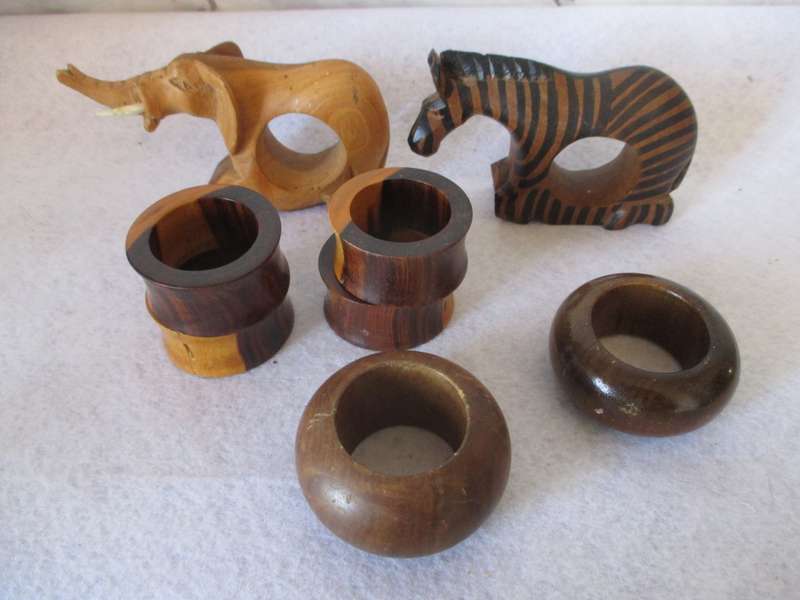 Lot of 8 handcarved wooden napkin holders.