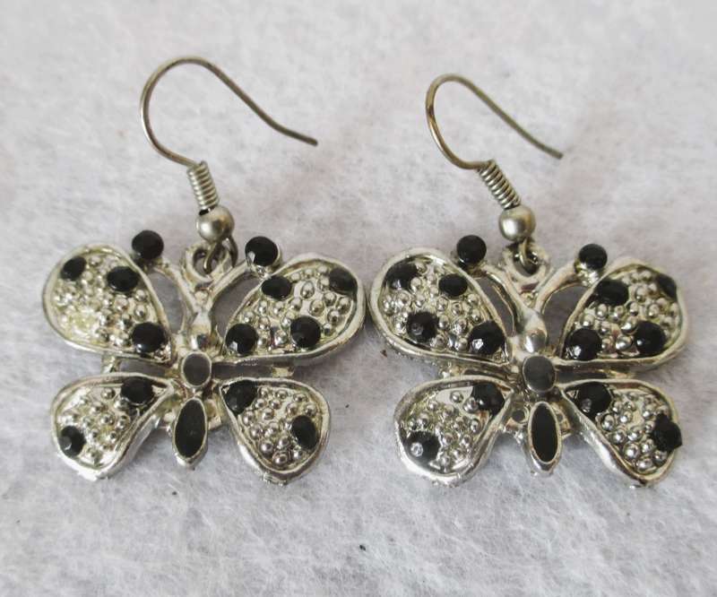 Lovely Silver metal Butterfly Drop Dangle Earrings with black stones.