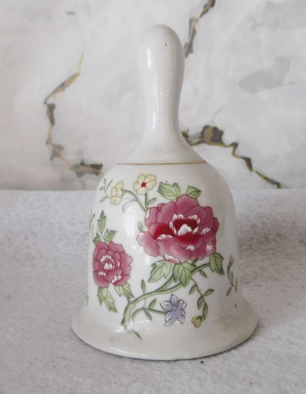 Lovely Vintage Porcelain Bell hand painted with roses. No chips or craks.