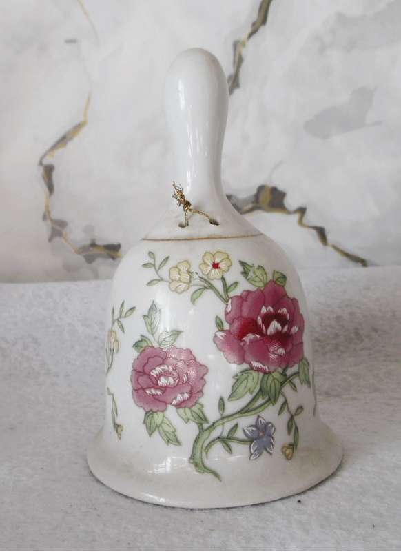 Lovely Vintage Porcelain Bell hand painted with roses. No chips or craks.