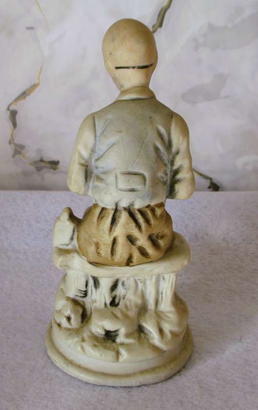 Vintage Bisque Porcelain Old Man Sitting on Bench with Cane/Pipe. 165mm hgh.