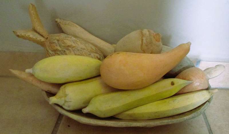 Mid century 12 pieces of vintage carved wooden fruit/vegetables/tray. Unique decor.