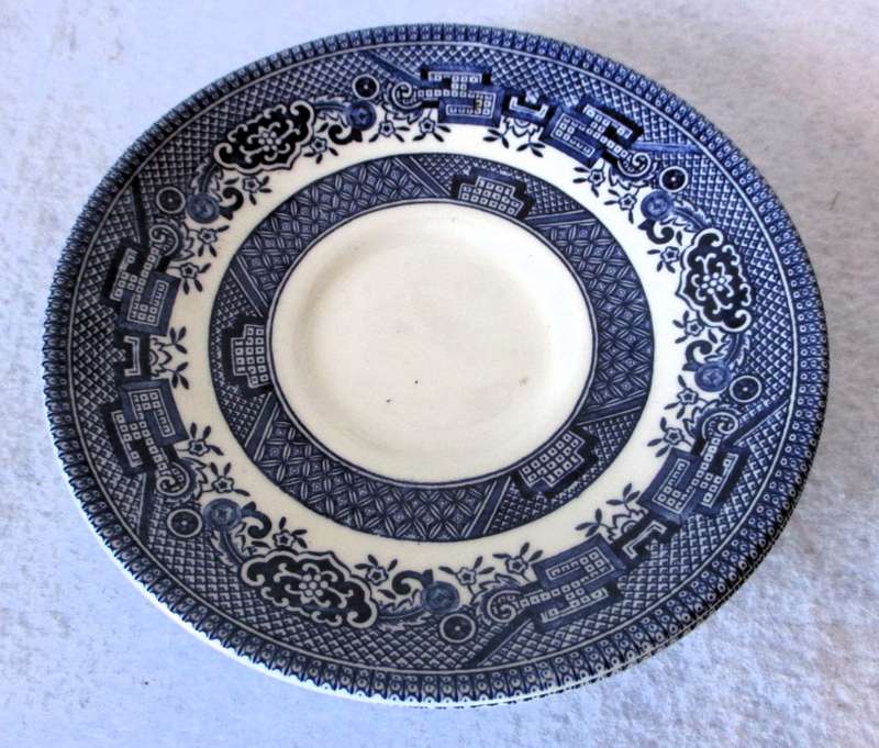 Two Blue and White saucers. Made in England.