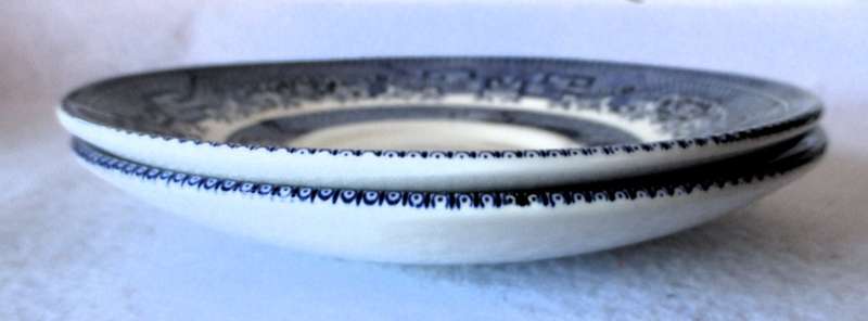 Two Blue and White saucers. Made in England.