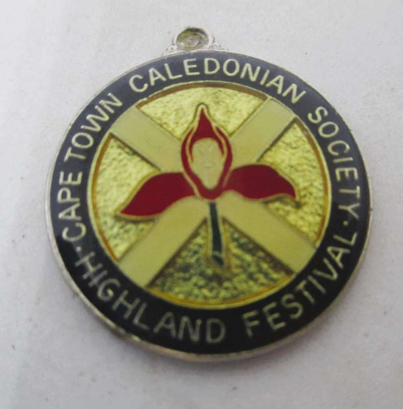 Vintage Cape Town Caledonian Society Highland festival enameled.