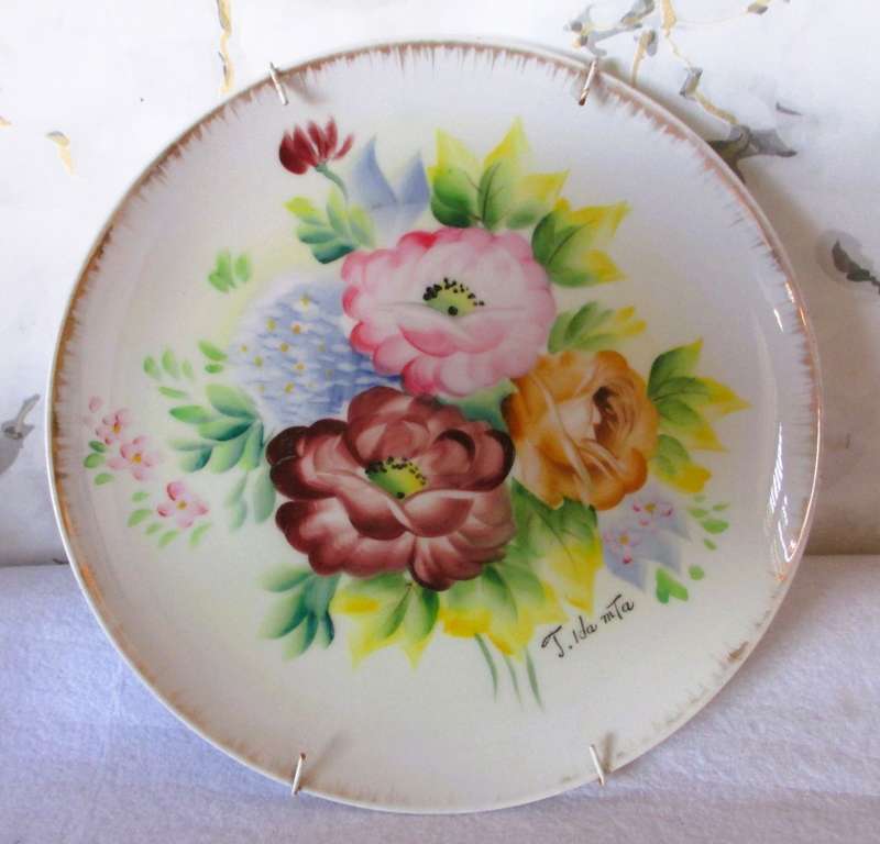 Vintage Porcelain hand painted Lamode wall hanging plate, with wire hanger.  circa 1960. 26cm dia.