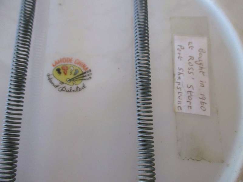 Vintage Porcelain hand painted Lamode wall hanging plate, with wire hanger.  circa 1960. 26cm dia.
