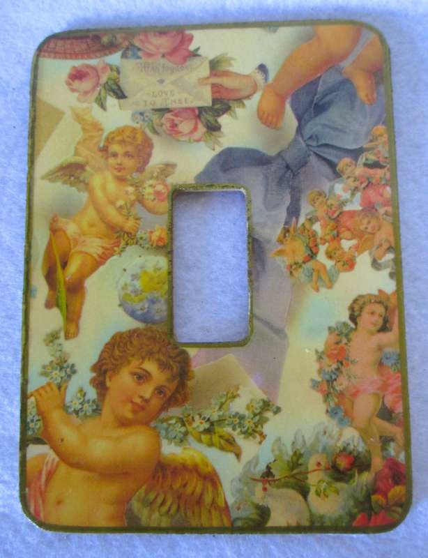 Four vintage themed light switch covers. Docrative.