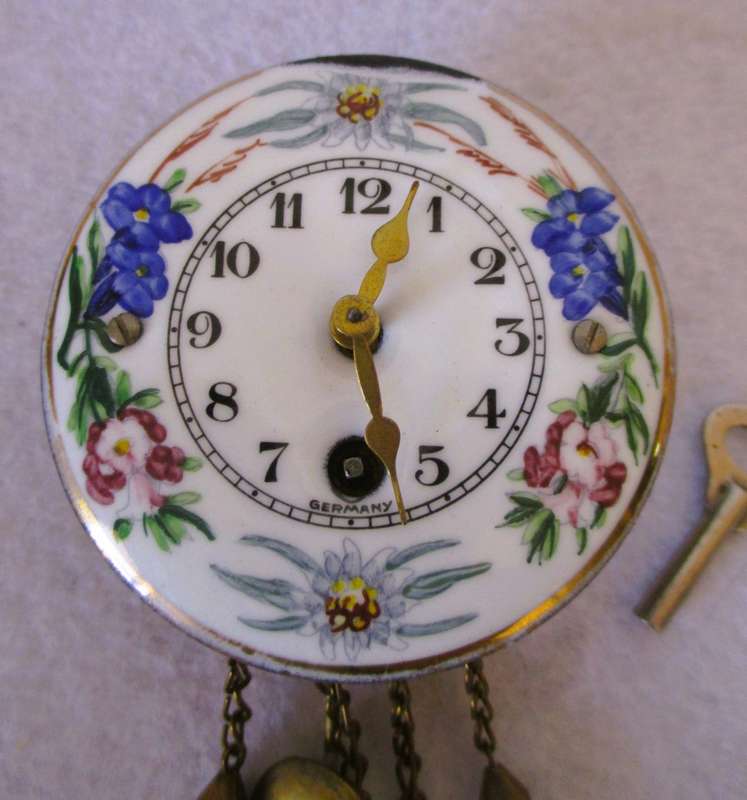 Vintage Wintermantel Germany Mini Porcelain Enamel Face Wall Clock with Key. Overwound. Photo scale.