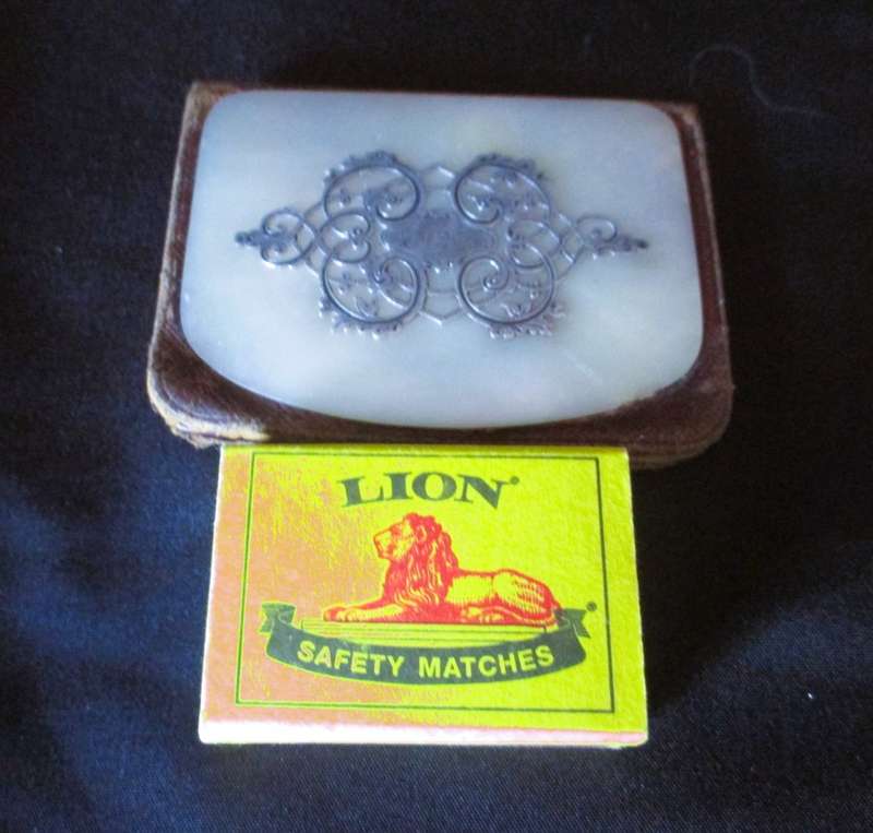Antique 18th Century leather wallet with mother of pearl shell and silver embossed.