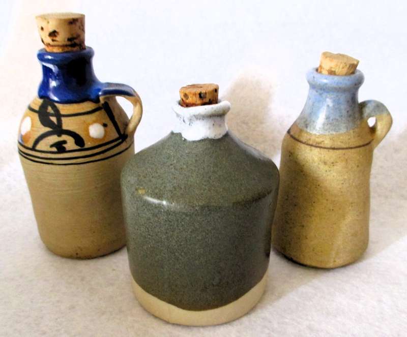 Lot of 3 Vintage Stoneware Jugs with cork. bigger 120mm high.