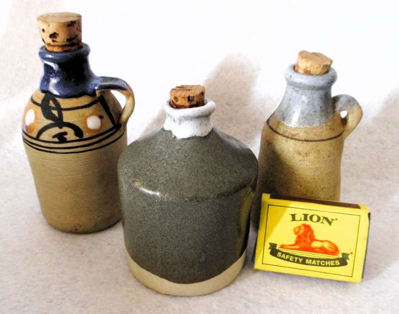 Lot of 3 Vintage Stoneware Jugs with cork. bigger 120mm high.