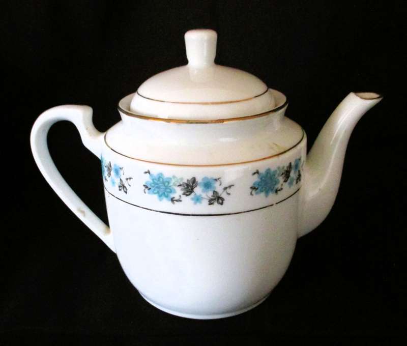 Blue and white China porcelain tea pot with hairline cracks, bottom. 140mm high.