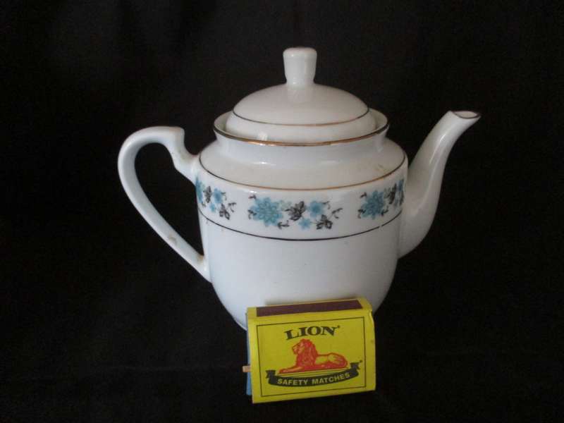 Blue and white China porcelain tea pot with hairline cracks, bottom. 140mm high.
