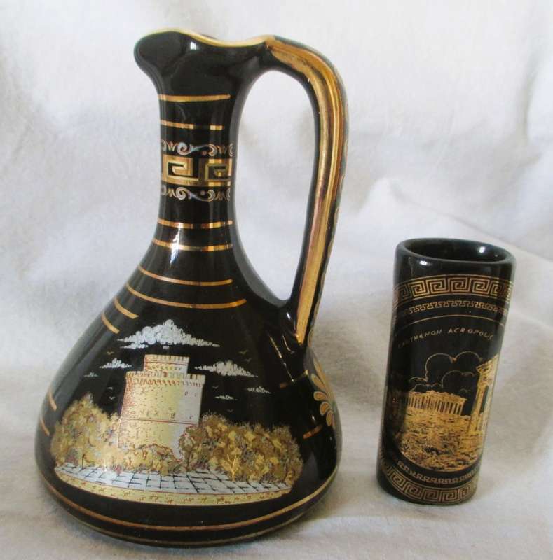 Two Strigosand Mantigos  Greek 24k Gold decorated Black Vases Pitchers. 130mm high.