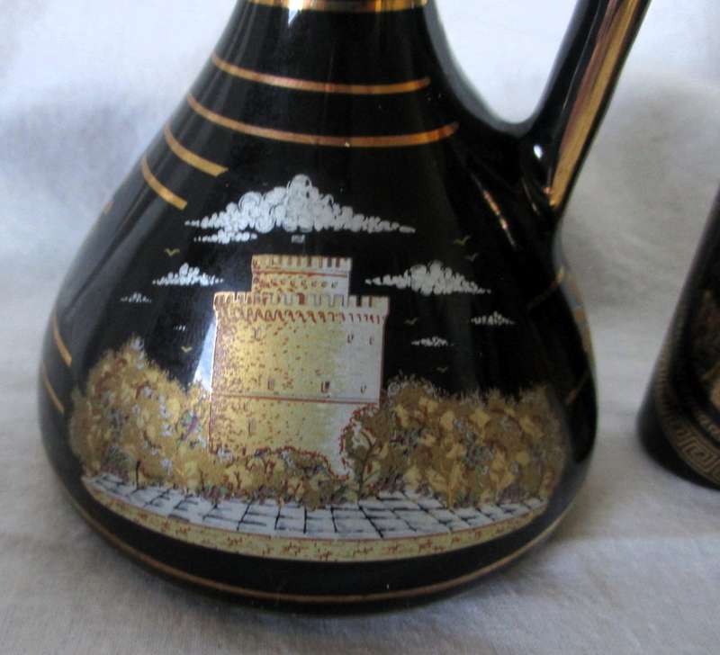 Two Strigosand Mantigos  Greek 24k Gold decorated Black Vases Pitchers. 130mm high.