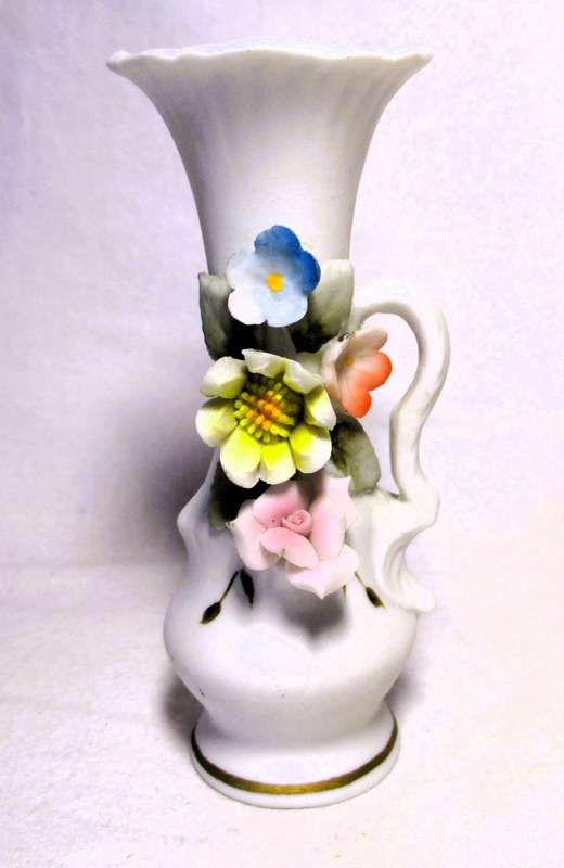 Two Vintage unglazed ceramic decor items. Delicate flowers on Vase and honey pot. Bilbao.
