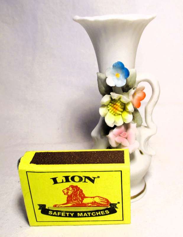 Two Vintage unglazed ceramic decor items. Delicate flowers on Vase and honey pot. Bilbao.