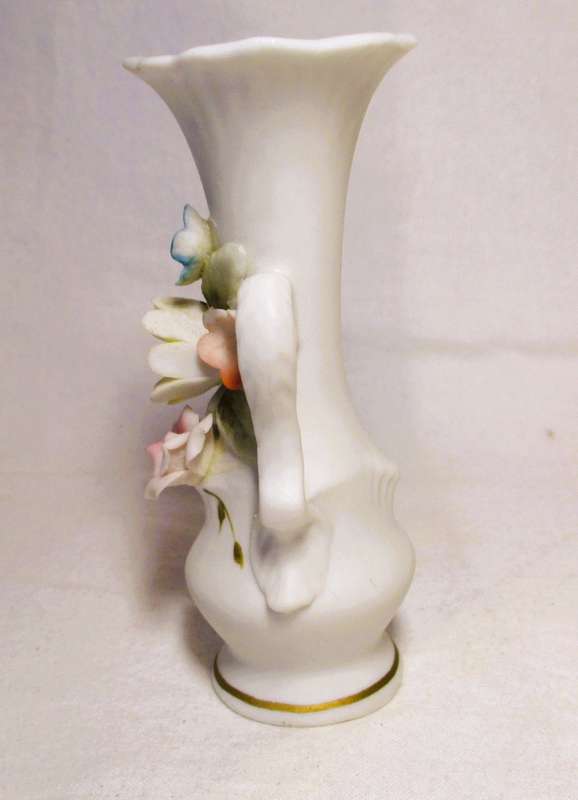 Two Vintage unglazed ceramic decor items. Delicate flowers on Vase and honey pot. Bilbao.