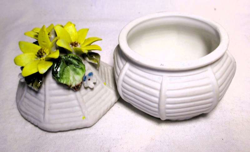 Two Vintage unglazed ceramic decor items. Delicate flowers on Vase and honey pot. Bilbao.