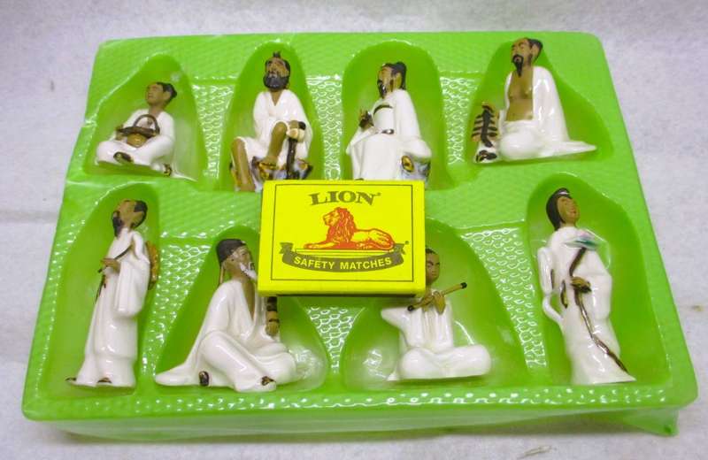 Vintage Chinese Eight Immortals figures hand painted Porcelain. In original box. Spotless.