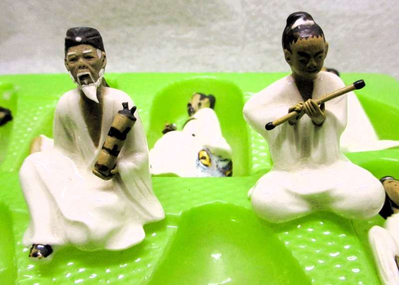 Vintage Chinese Eight Immortals figures hand painted Porcelain. In original box. Spotless.