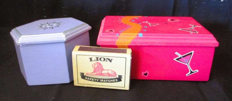 Two Wooden painted trinket boxes.