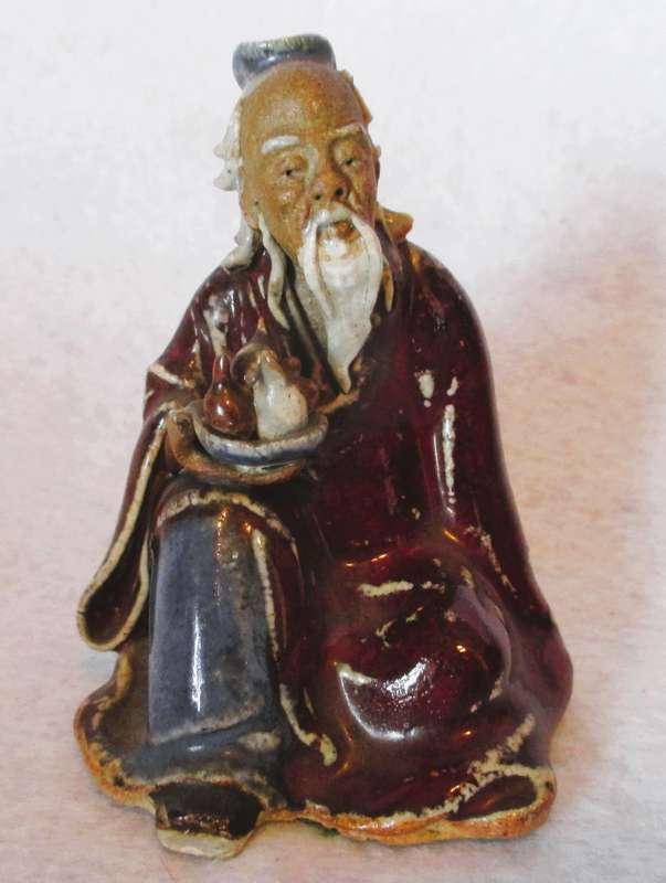 Vintage Chinese flambé glazed pottery figure,  early 20th century. Lots of caracter. 80mm high.