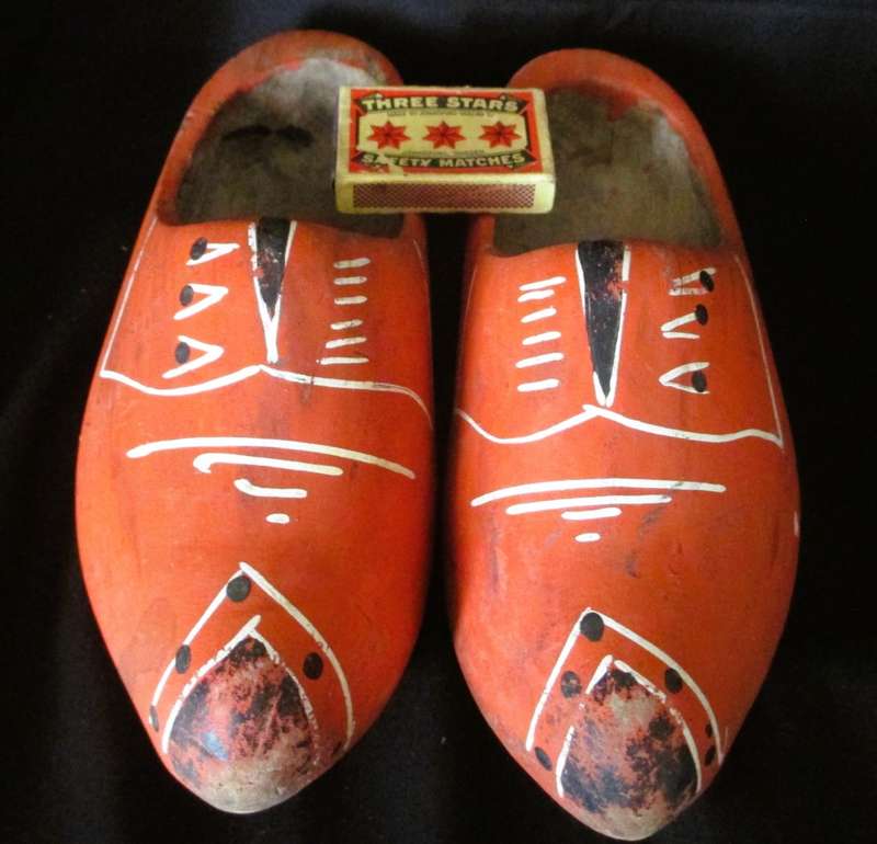 Dutch wooden clogs used as a decorative element. 22cm long.