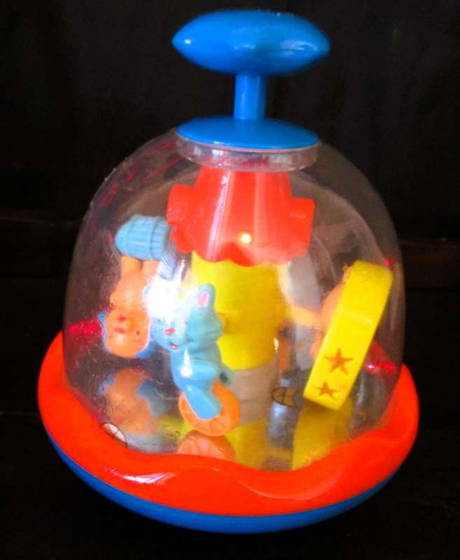 VINTAGE PUSH`N MERRY-GO-ROUND KIDS TOY CAROUSEL, WORKING. 170MM HIGH.