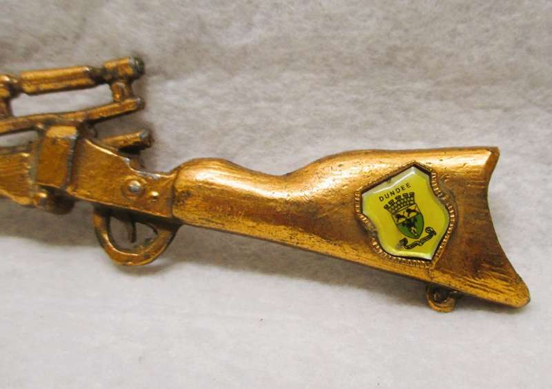 Vintage Miniture brass Rifle with Dundee Crest. 180mm long