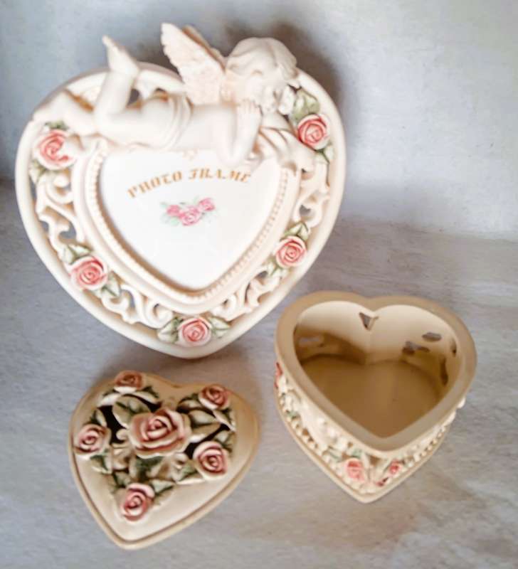 Heart shape porcelain jewelry box and photo frame with cherub baby.