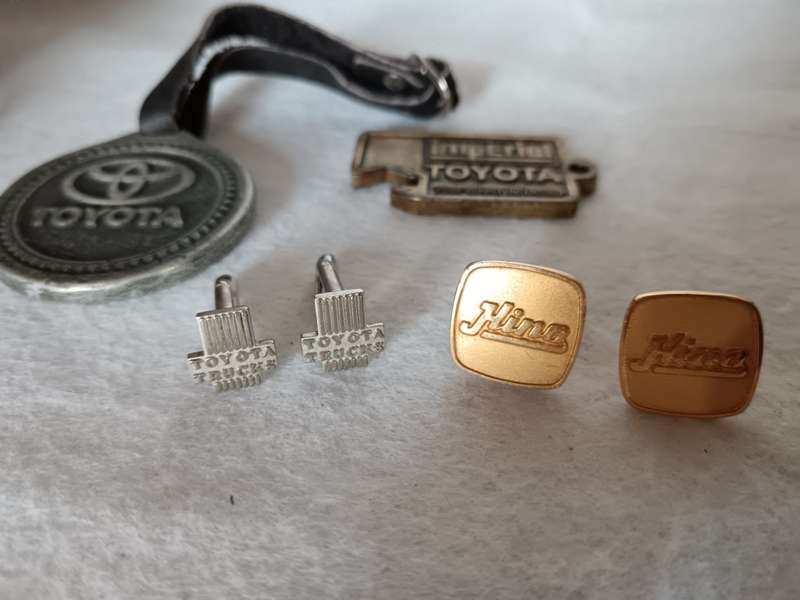 Lot of Vintage Toyota cuff links and other memorabilia. As per photo.