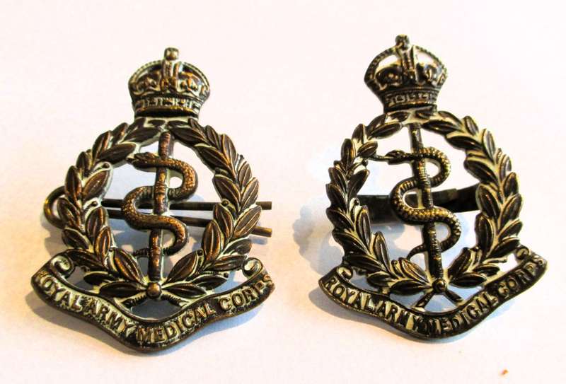 Pair of British - `Royal Army Medical Corps` Cap Badges