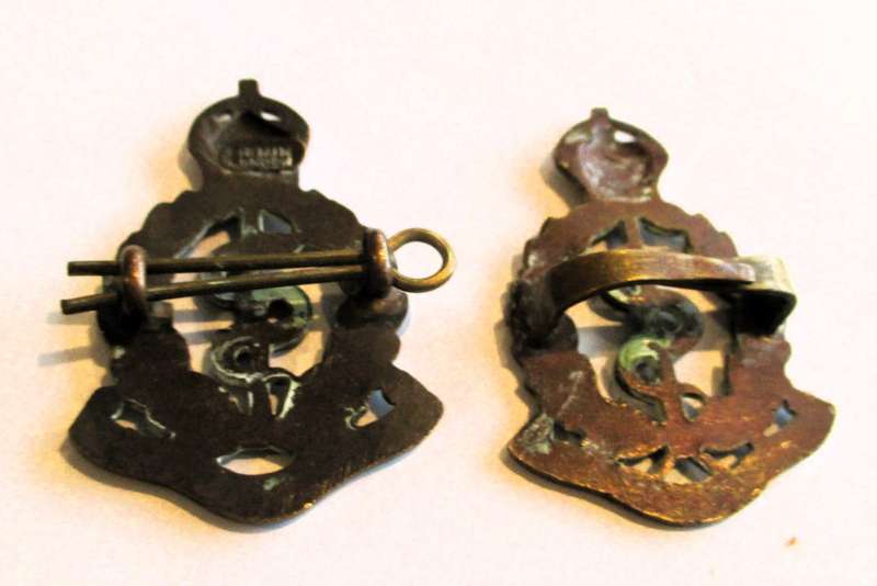 Pair of British - `Royal Army Medical Corps` Cap Badges