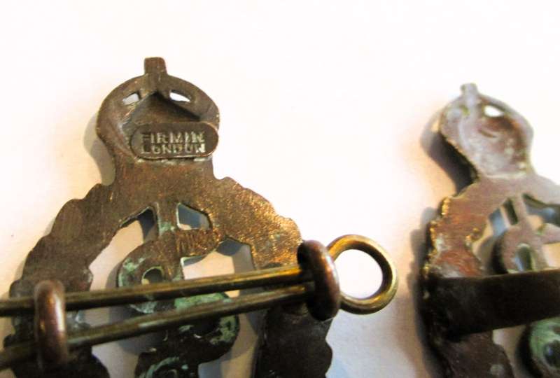 Pair of British - `Royal Army Medical Corps` Cap Badges