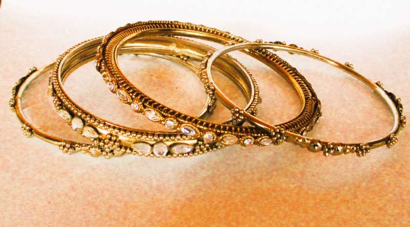 4 x Indian Traditional Ethnic Bangles.. Gold color with rhinestones.