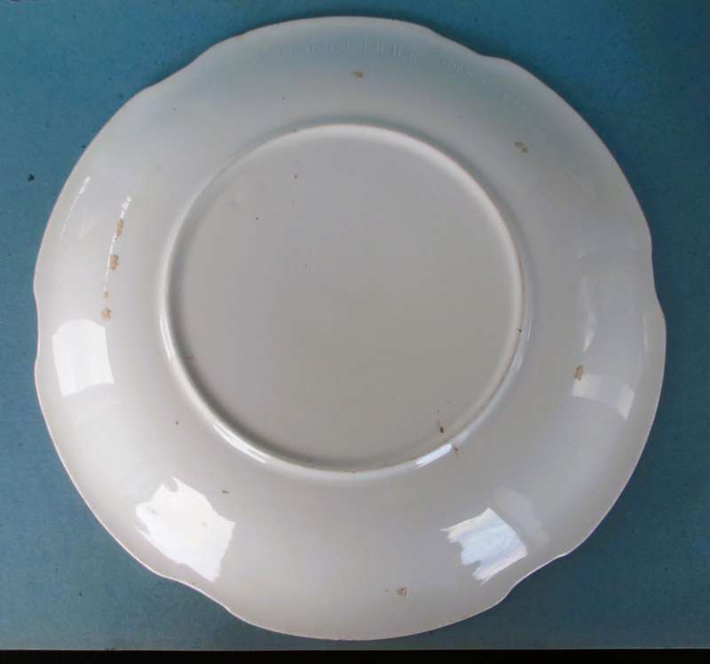 Two Antique green and pink floral plates Unmarkd. Lovely. 230mm diameter.