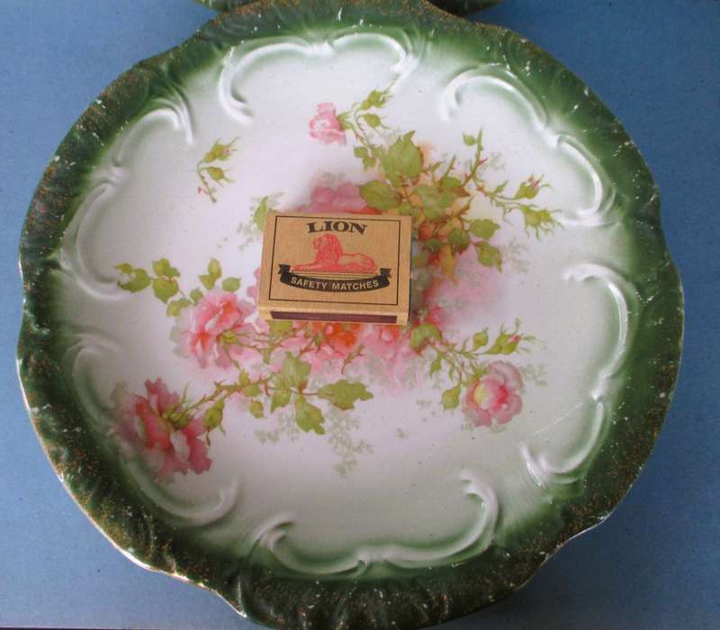 Two Antique green and pink floral plates Unmarkd. Lovely. 230mm diameter.