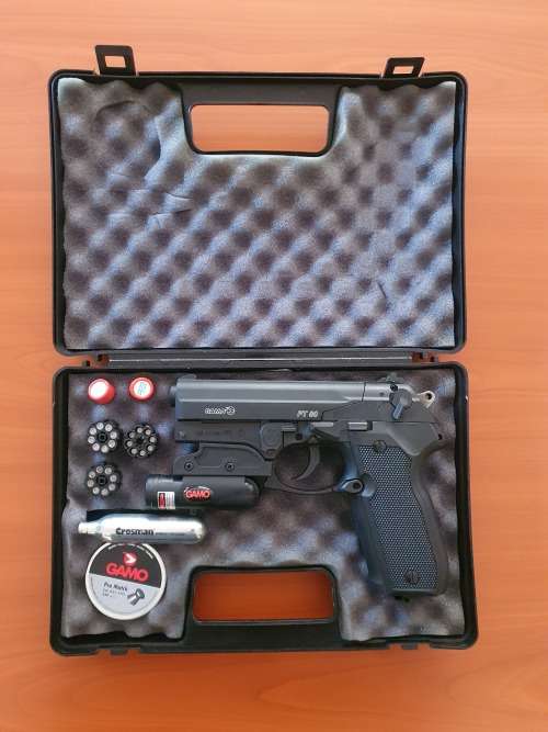 Gamo PT80 semi auto air pistol with laser sights and accessories