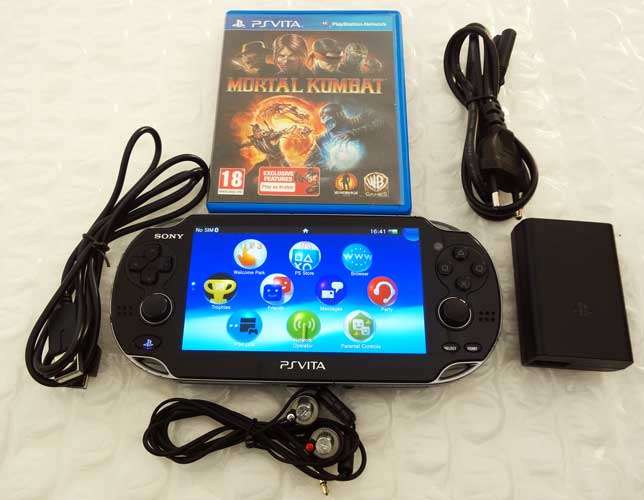 SONY PLAY STATION VITA (PS VITA) 3G, WIFI , PS VITA EARPHONES,8GB MEMORY CARD+ GAME, ETC