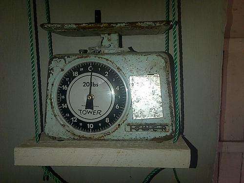 weathered Tower scale in pounds