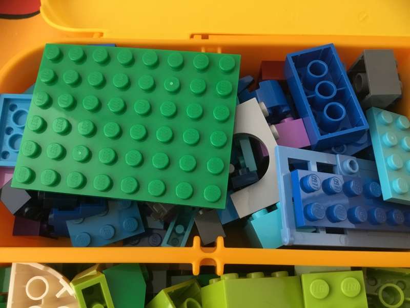 Lego blocks in yellow lego box